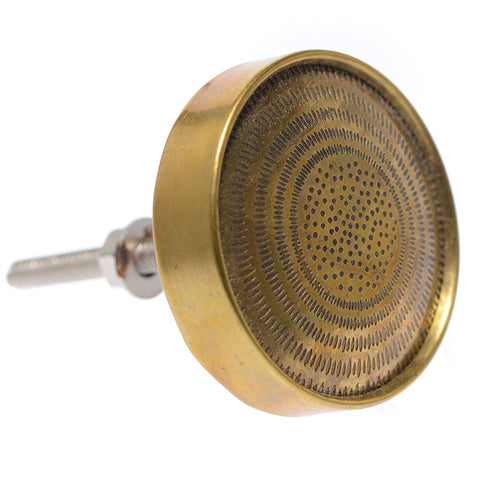 Brass pull with starburst pattern