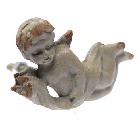 Cast iron cherub pull facing left