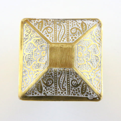 Square gold and white embossed pull with paisley pattern