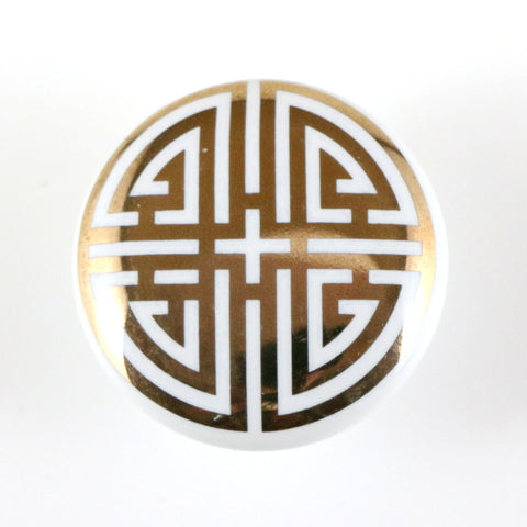 White ceramic pull with gold Asian motif