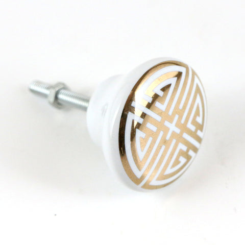 White ceramic pull with gold Asian motif
