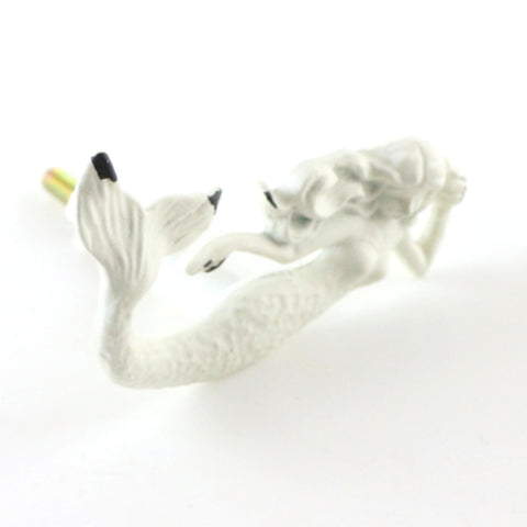Cast aluminum laying mermaid pull with white distressed finish