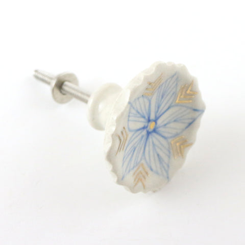 Hand painted ceramic pull with blue and gold flower motif