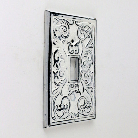 Cast iron scroll pattern switch plate 